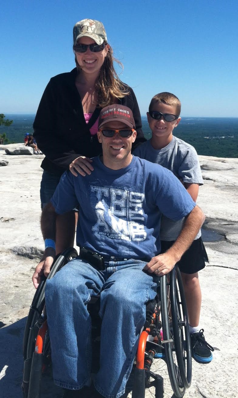 Jason and Laura Dugmore with their son on Stone Mountain, Georgia