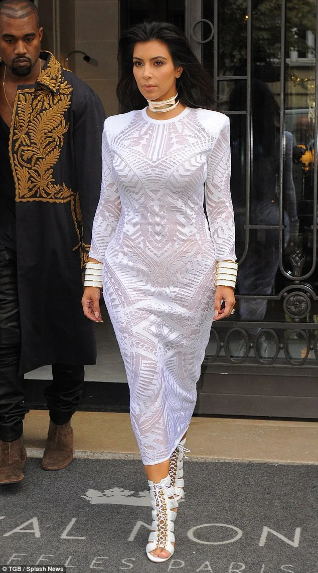 1411653640417_wps_107_Kim_Kardashian_and_Kanye_.jpg