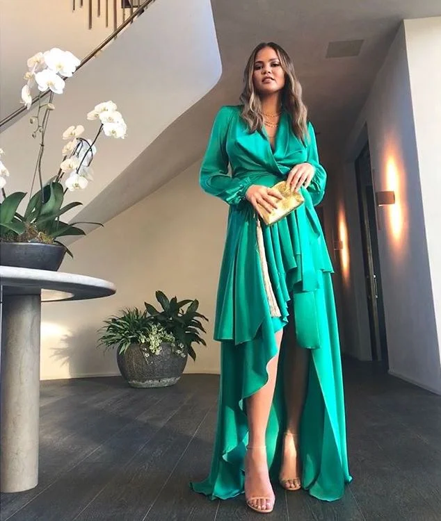Chrissy for KKW baby shower.jpg