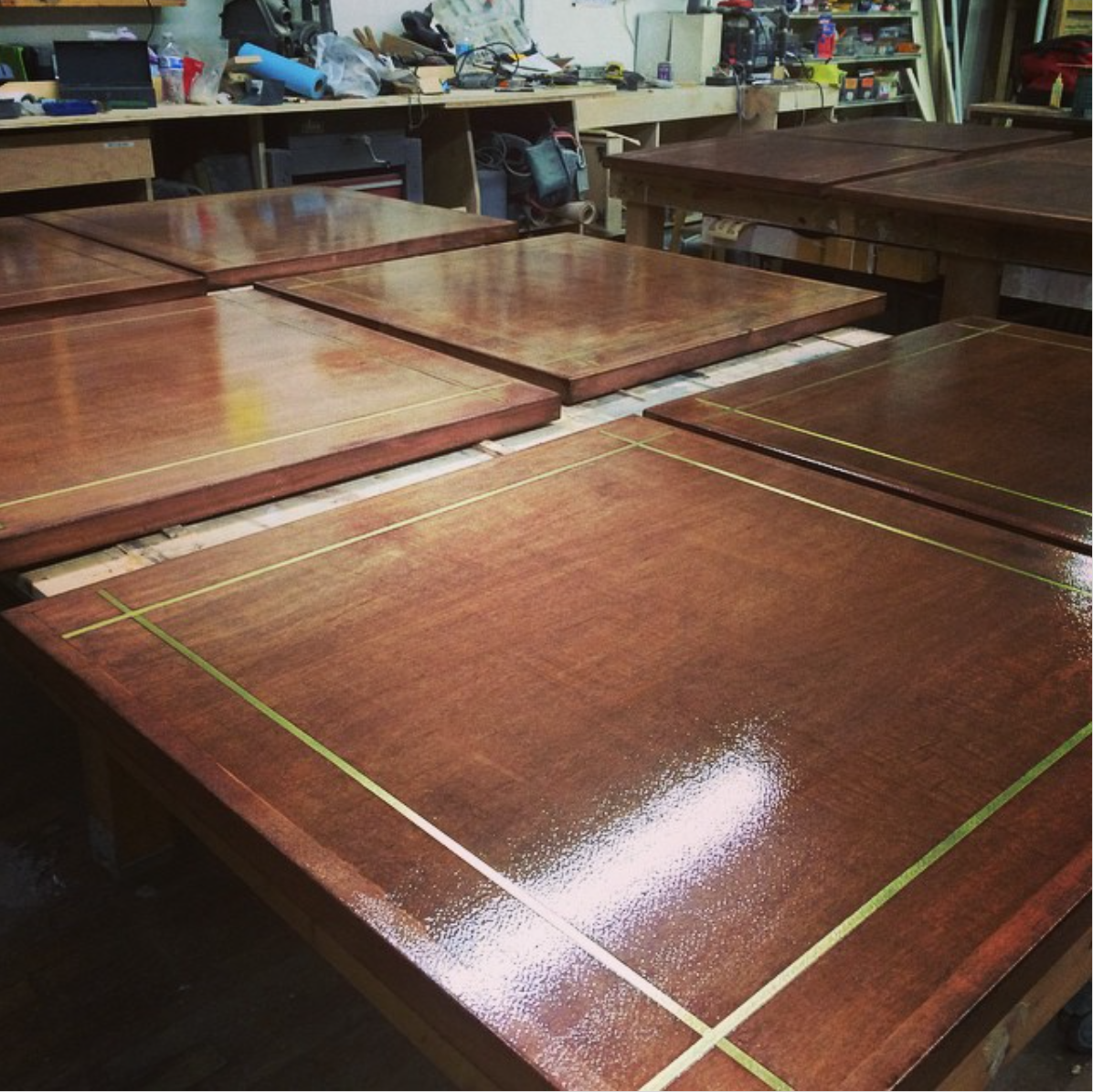 Wood table with brass inlay