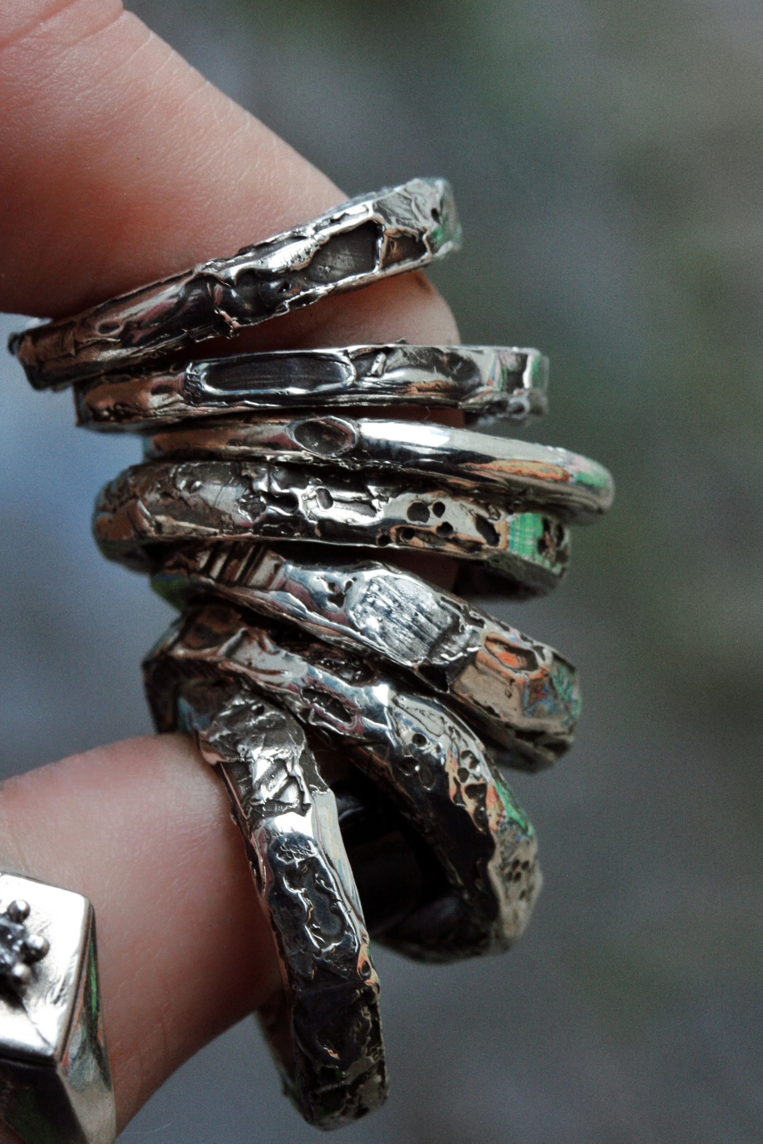 set of stacking rings in models hand