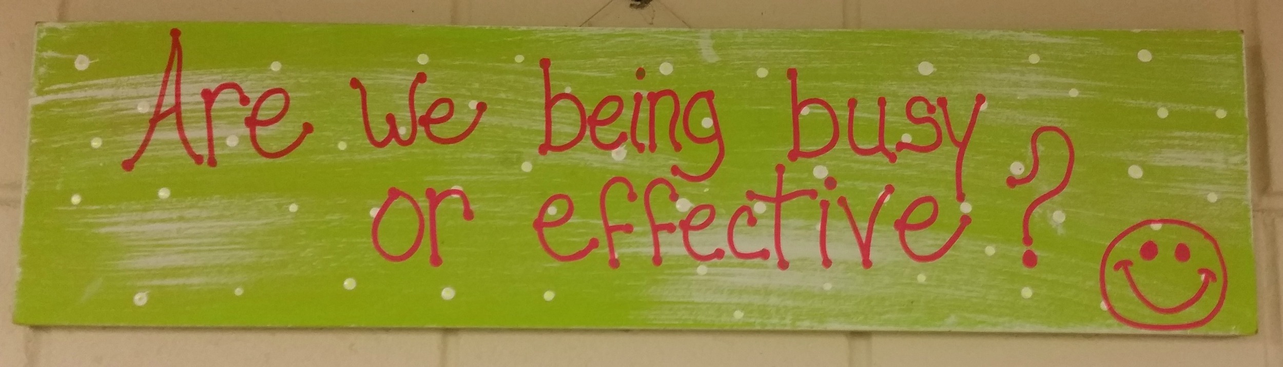 A homemade reminder hangs on the wall in the office of one of my clients. 