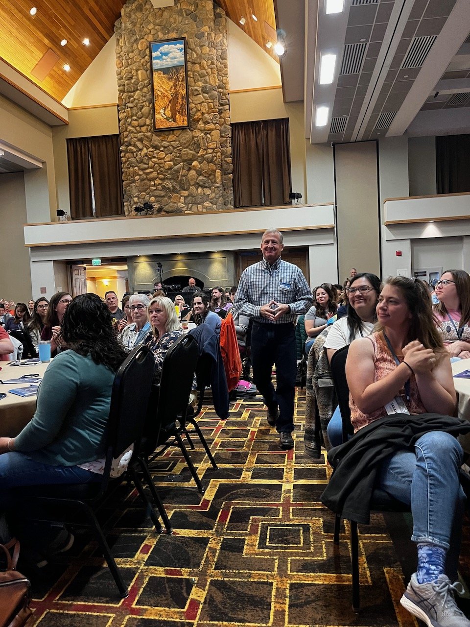 TMI Founding Director Dr. Jeff Linkenbach arrives for the opening keynote.