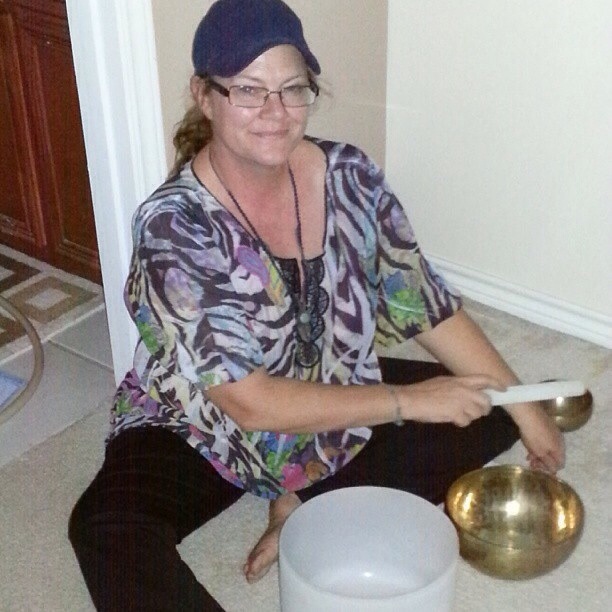 Shar plaing the crystal bowls