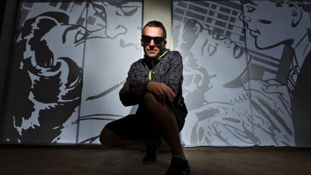 Graphic artist Klaasz Breukel with his window display on Bridge Street. Alden Williams/Fairfax NZ