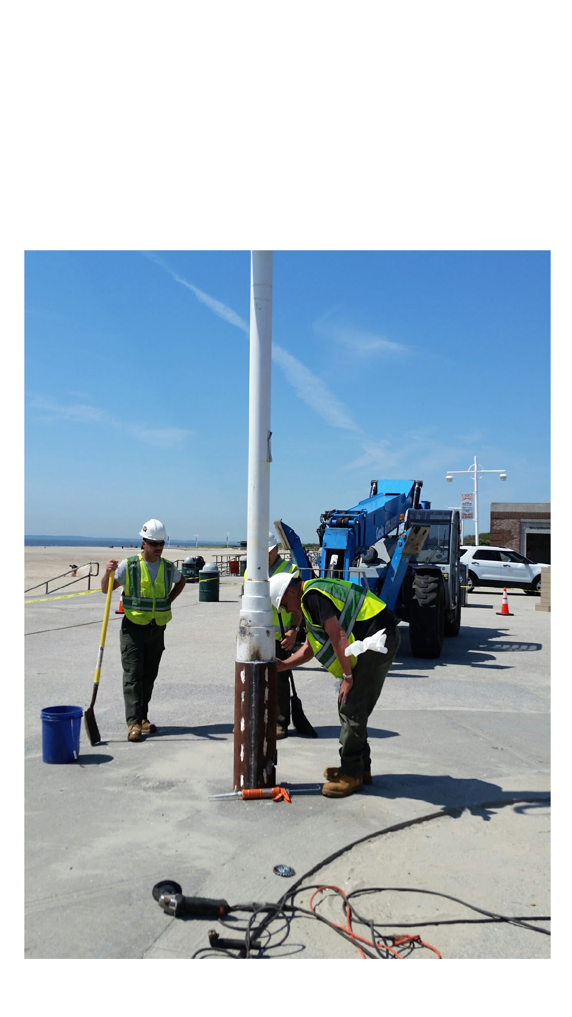 Cast iron light post repaired with 10" sched. 40 pipe sleeve