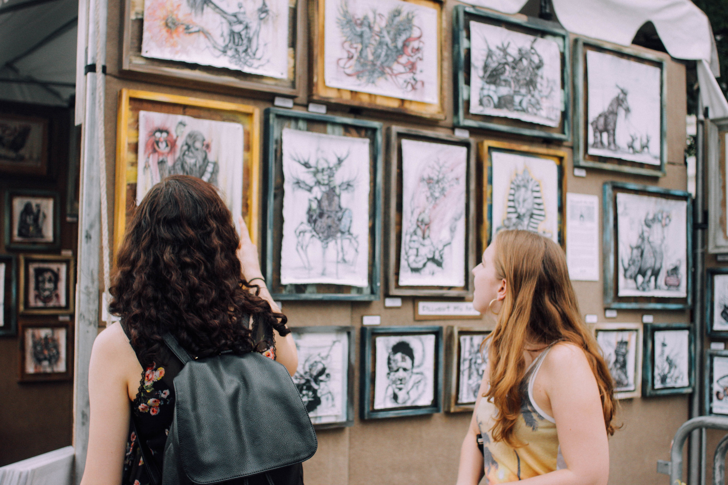 Mel + Felice check out some Artscape vendors. 
