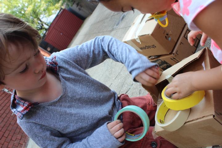 We give children simple materials that can be combined to make projects of varying complexity, according to their skill and interests. We love boxes! They can become anything children want them to be! We love tape! As all children do . . . We present some of the same materials each week, so that children, if returning to our program, can become proficient in the many "languages" of expression available to them as creative human beings.