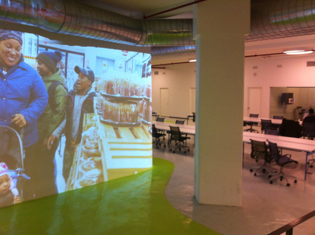 Invisible Child (NYTimes) Photo essay projected onto wall at Made in NY Media Center. The projections in the space are ever-changing.