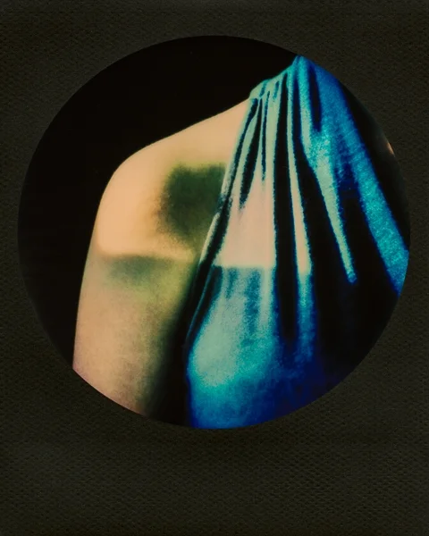Light Drapes Over Shoulder