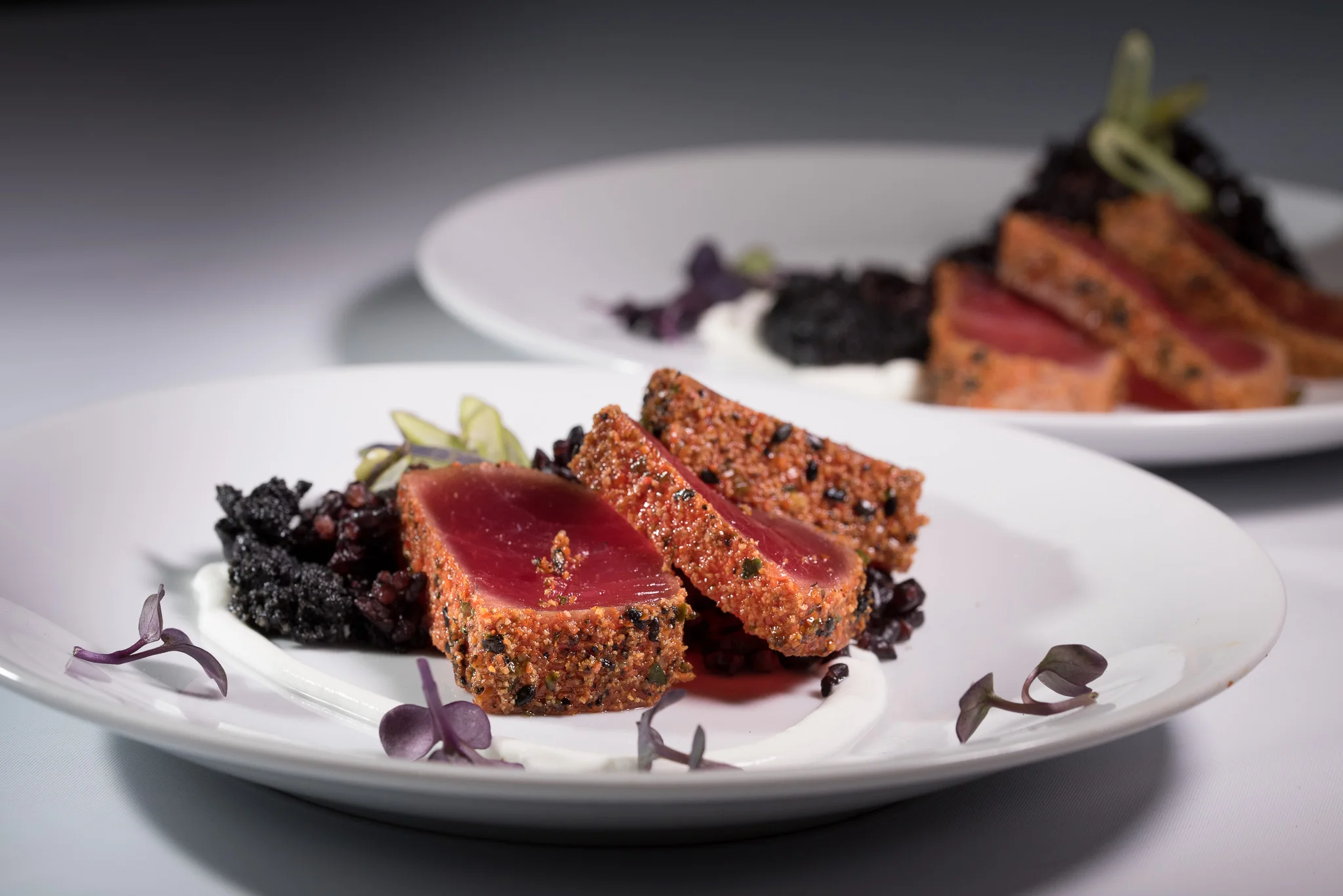 FISH TOGARASHI| Togarashi Crusted and Seared Yellowfin, Korean Black Sesame Butter, Forbidden Rice, Lime Creme Fraiche, Micro Ruby Radish