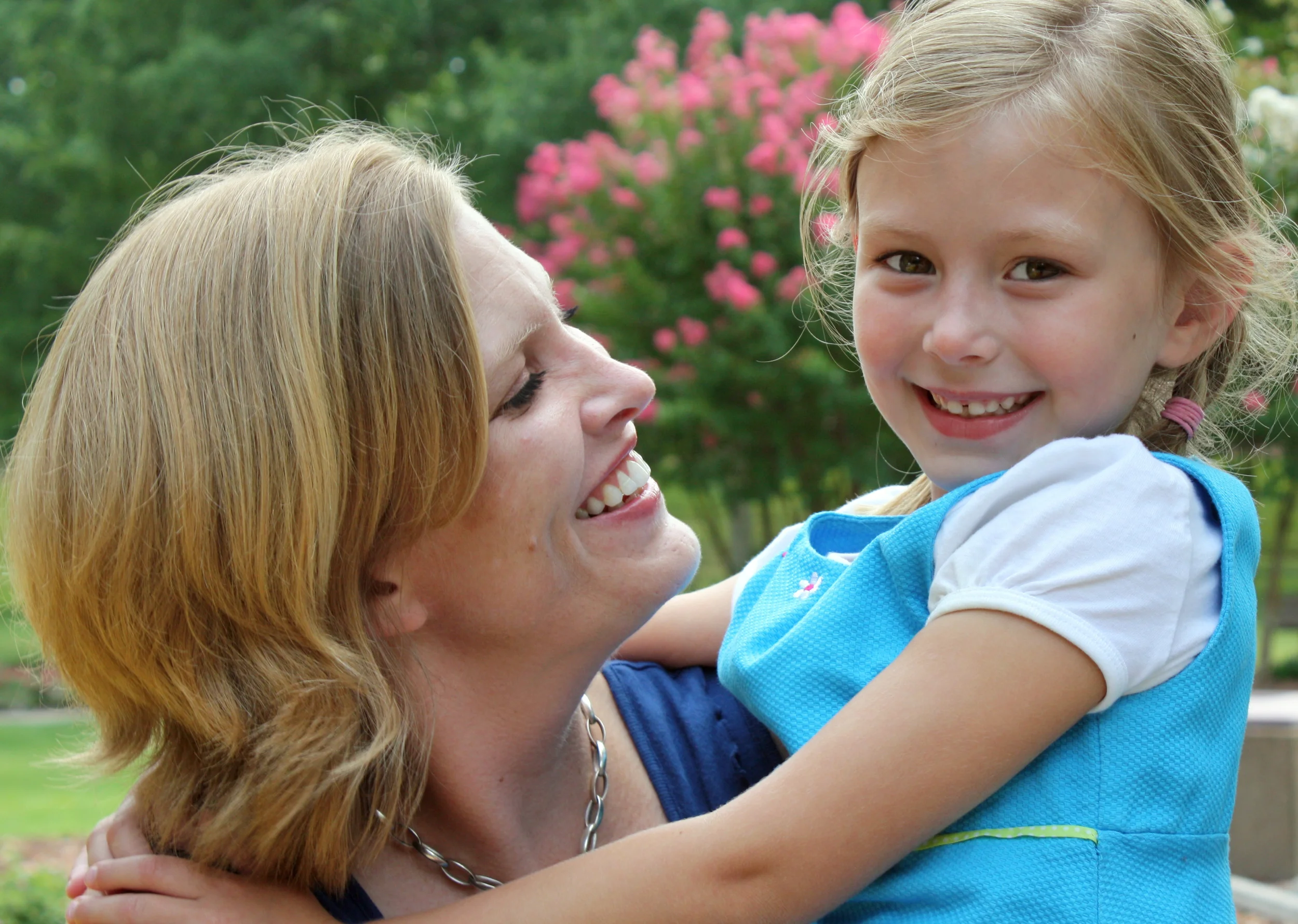  An image of a mother with her daughter during a family portrait session in Greensboro, North Carolina.&nbsp; 