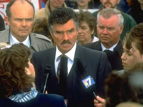 Burt Reynolds in CITIZEN RUTH (with Kurtwood Smith on his left)