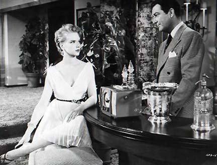 Anne Francis as Nancy Corlane with Robert Taylor as Christopher Kelvaney in Rogue Cop