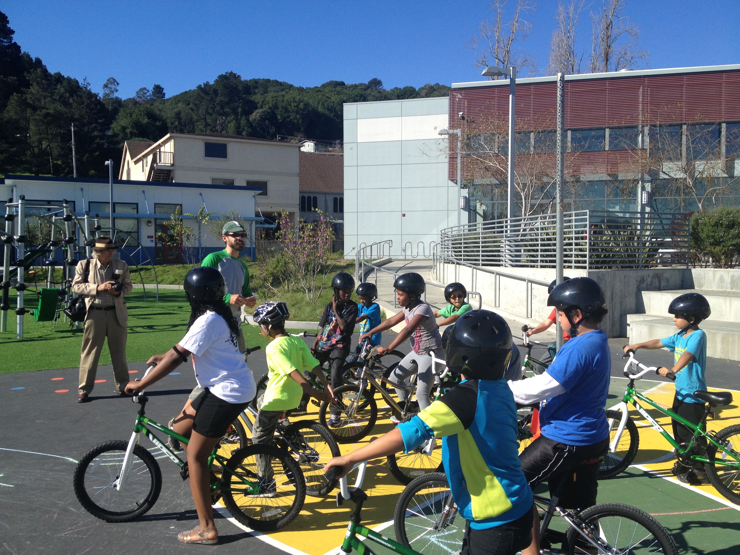 James, from Safe Routes, teaches the riders about safe riding.