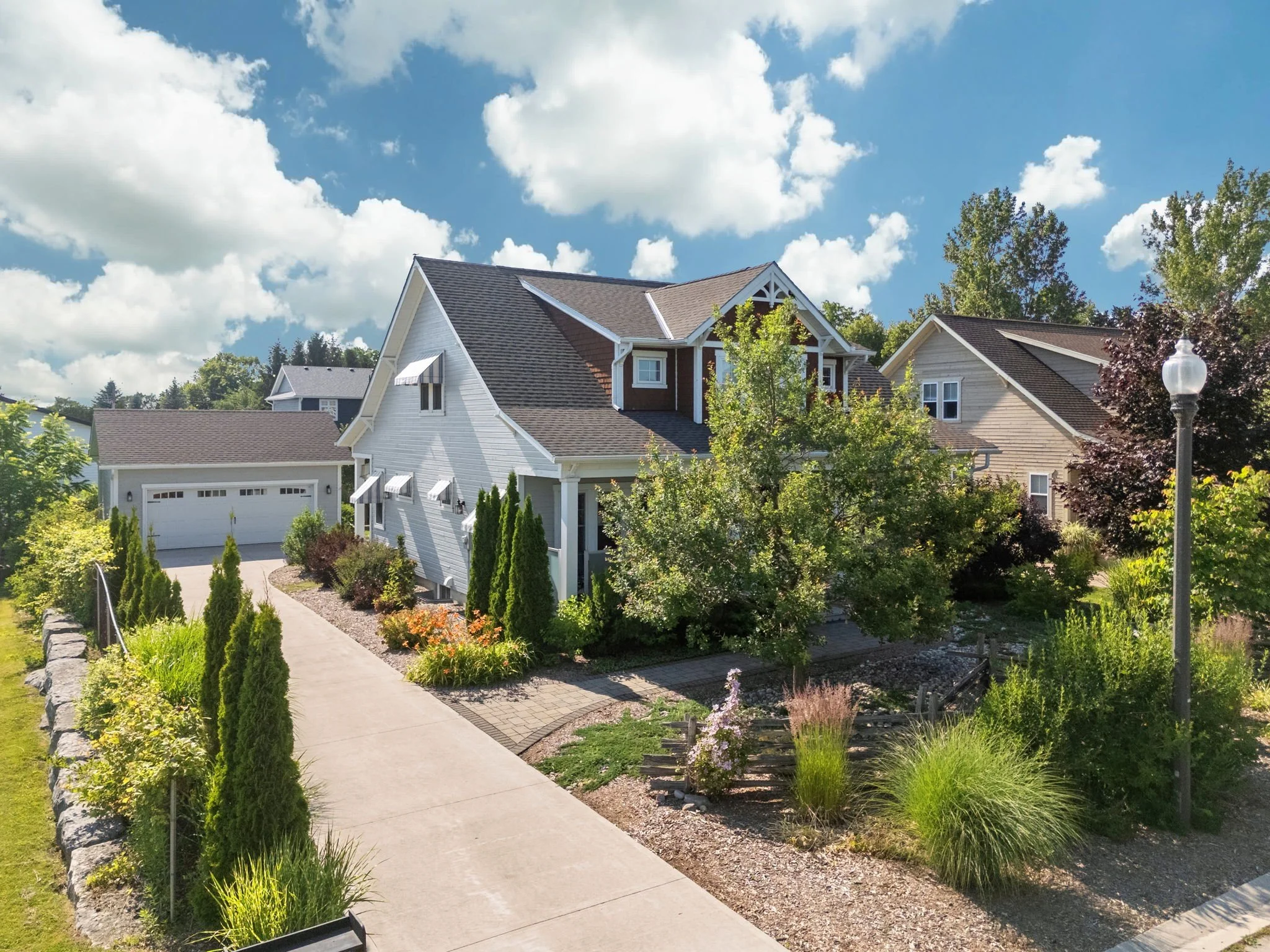 Gorgeous Curb appeal at this Custom Built by Adam Durand home.