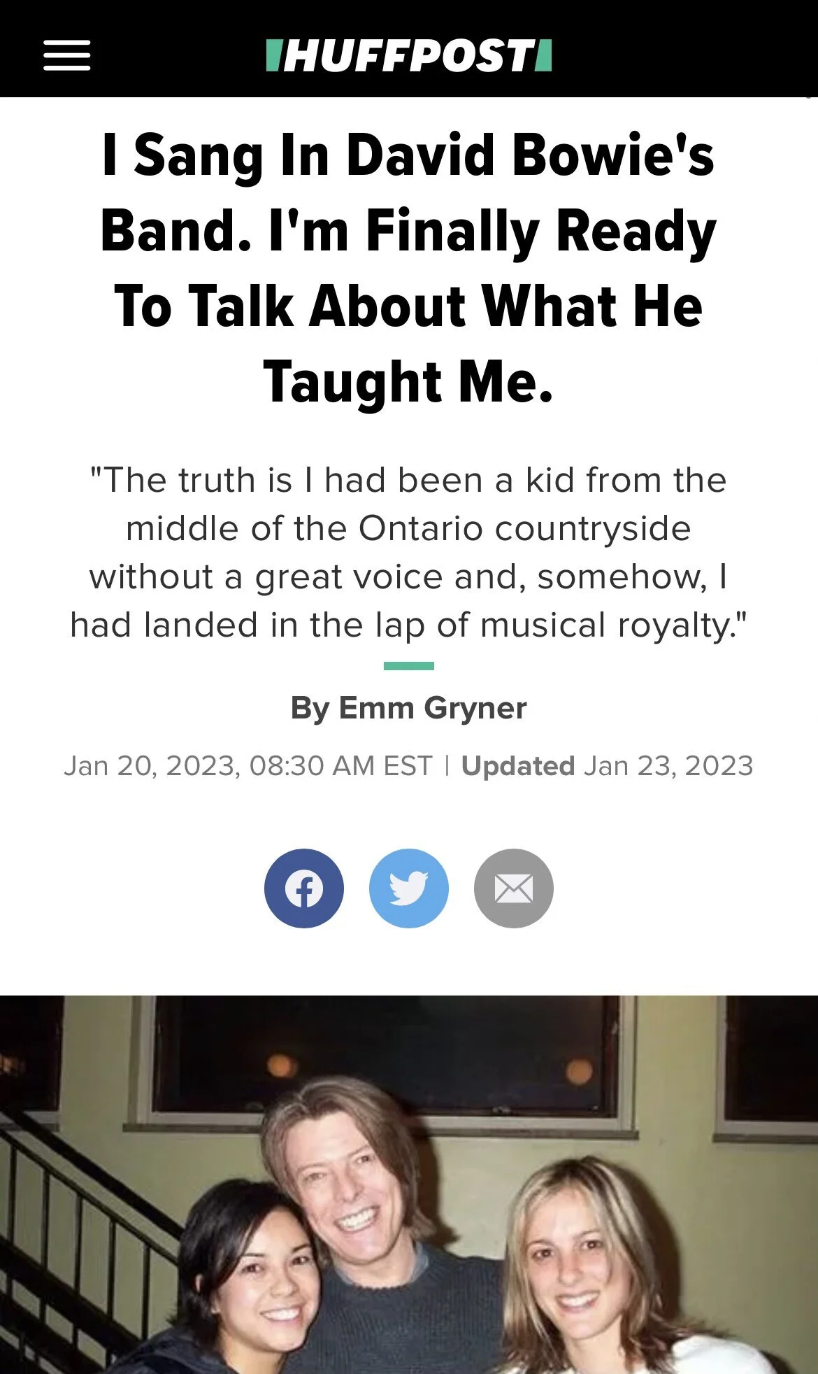 A photo of an article about Emm Gryner with a photo of her with David Bowie.