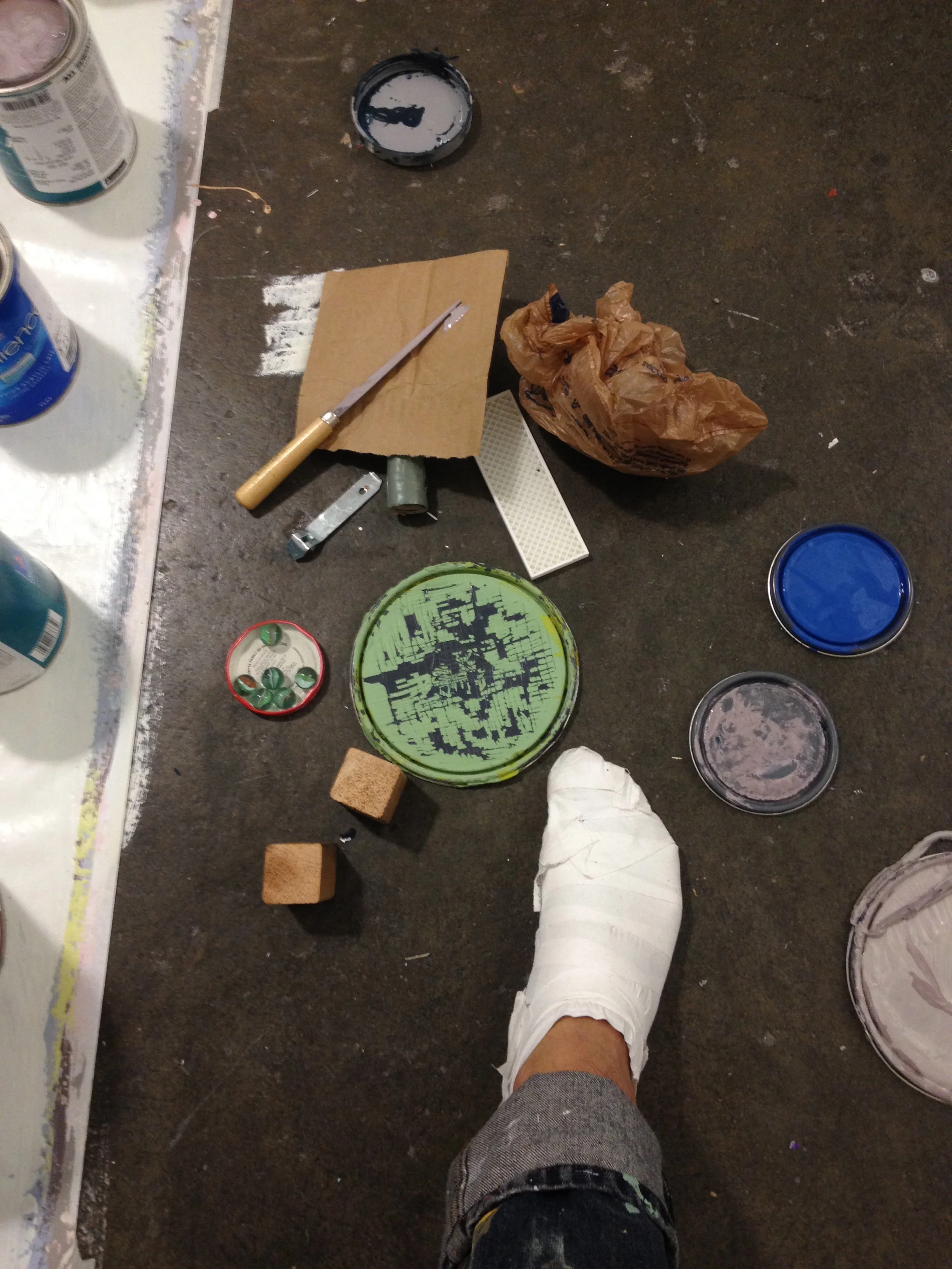 tools: can opener, lids, marbles, plastic bag, wood blocks, 3d printer plastic thing, clay cutting knife, cardboard, taped feet, hands(not shown), no brushes were used -they were all dirty and painting with a brush is boring-