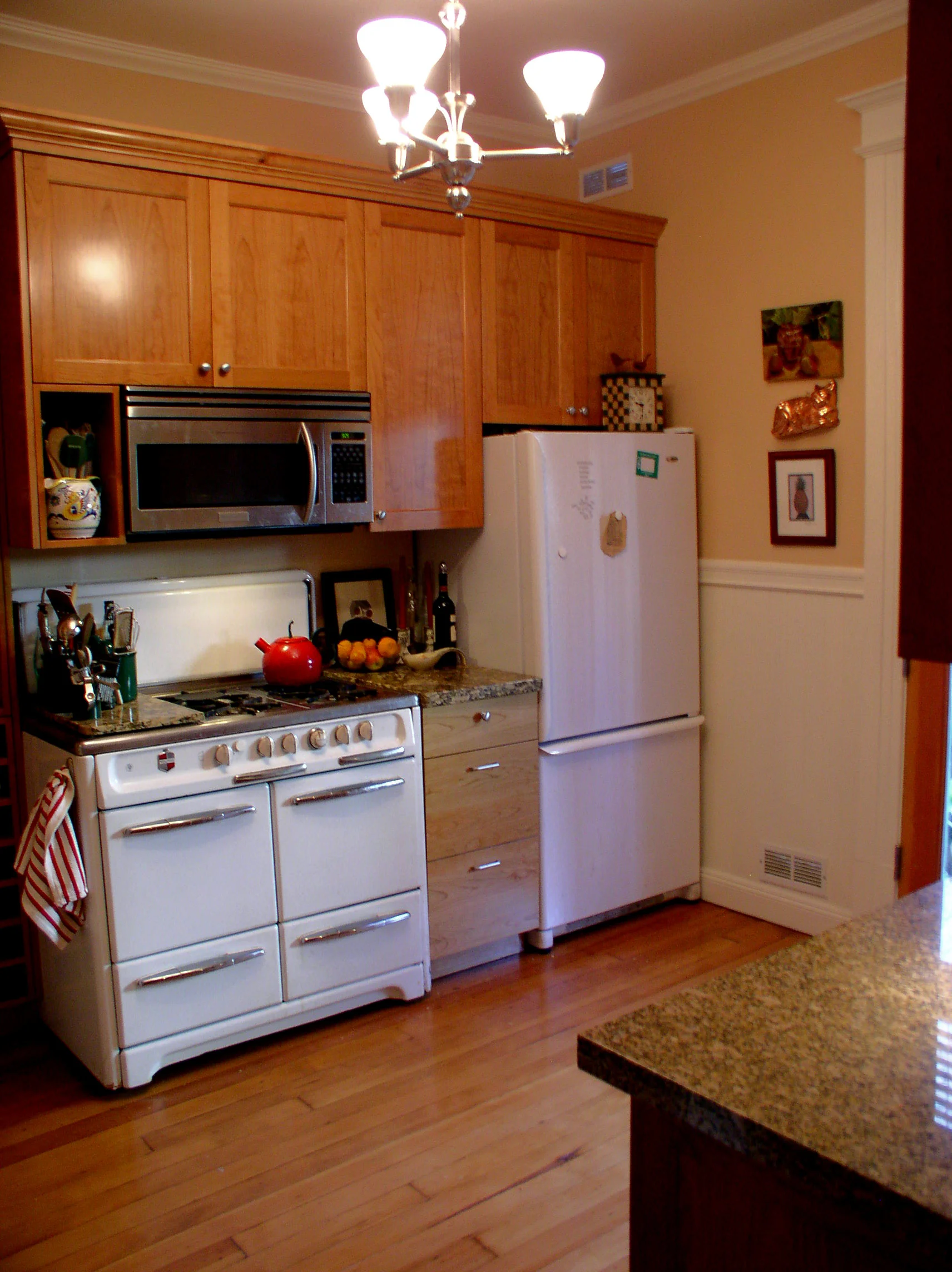 After: Cherry cabinets and granite counter