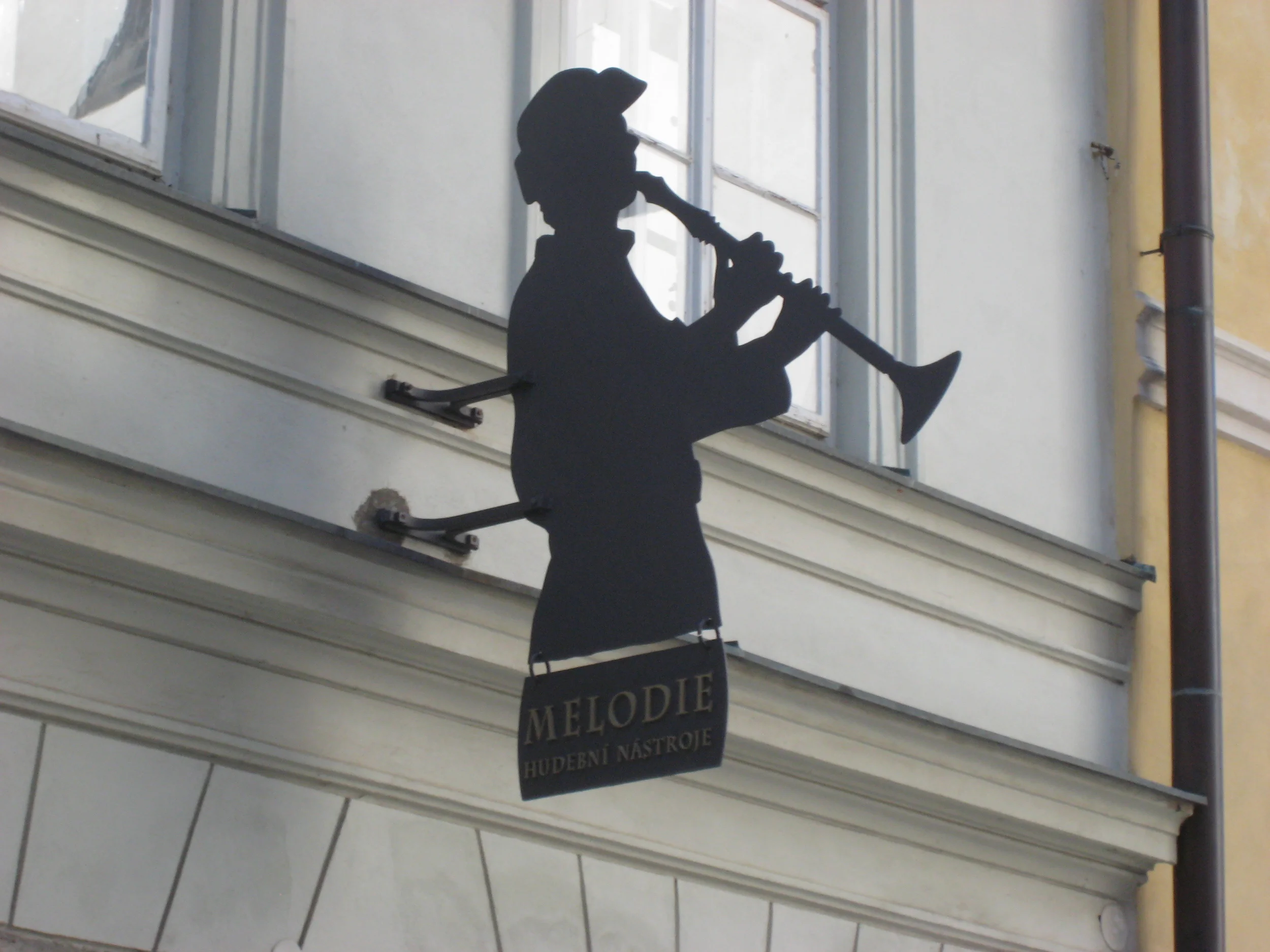 Unique shop signs in Cesky Krumlov
