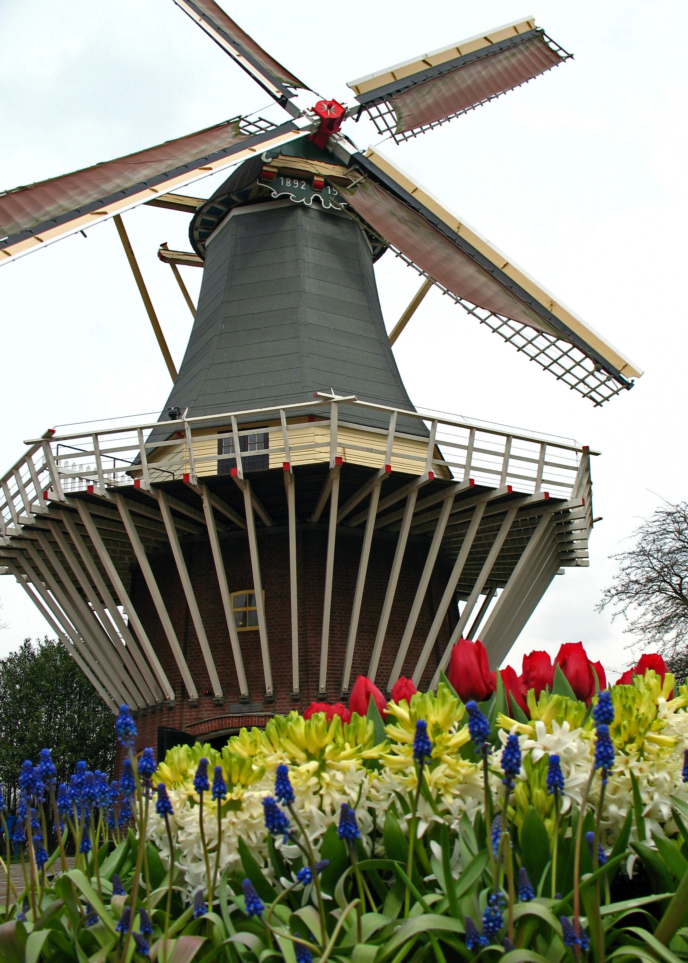 A vintage windmill at the Kuekenhof Gardens