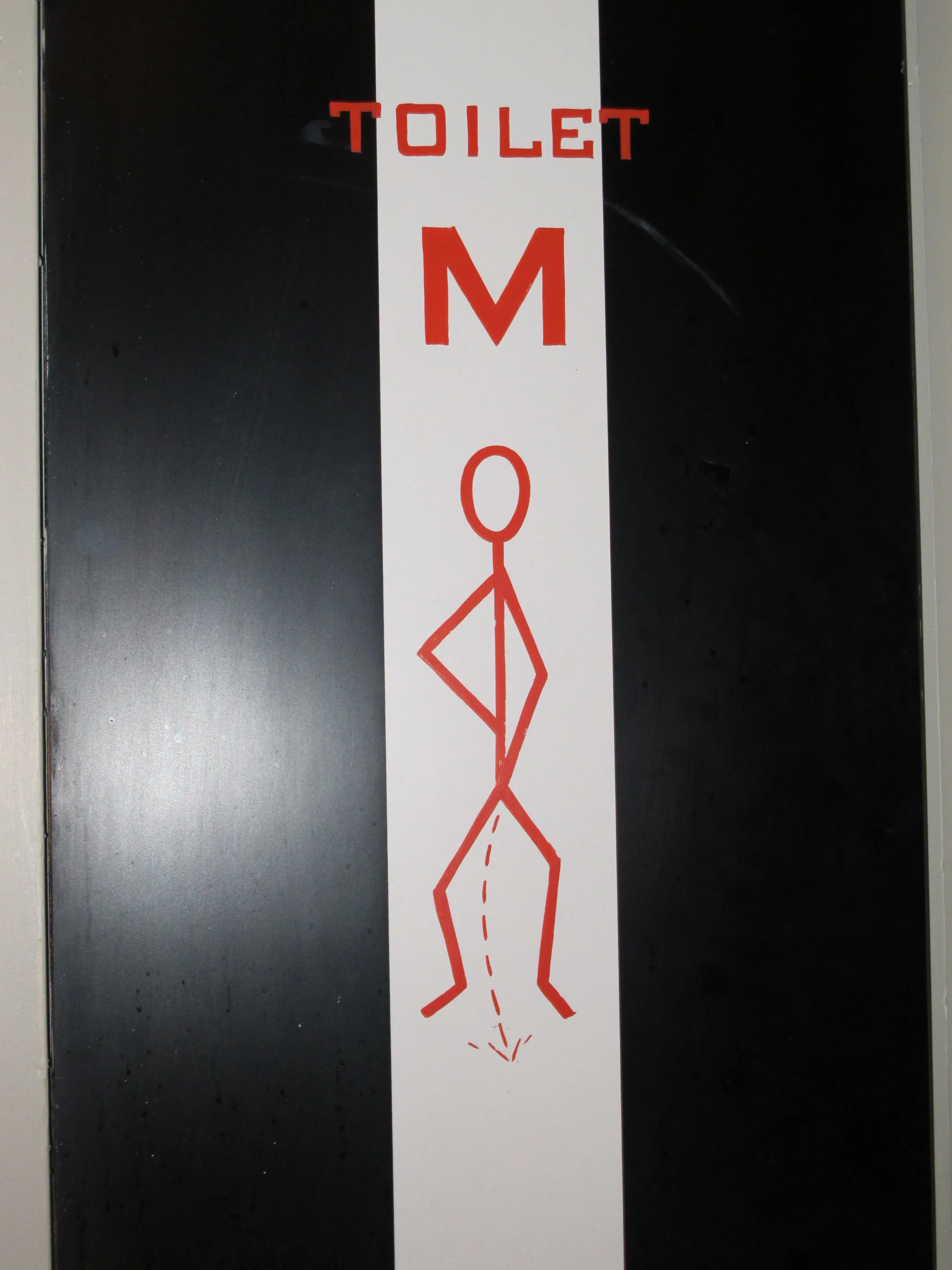 Most graphic bathroom sign ever!