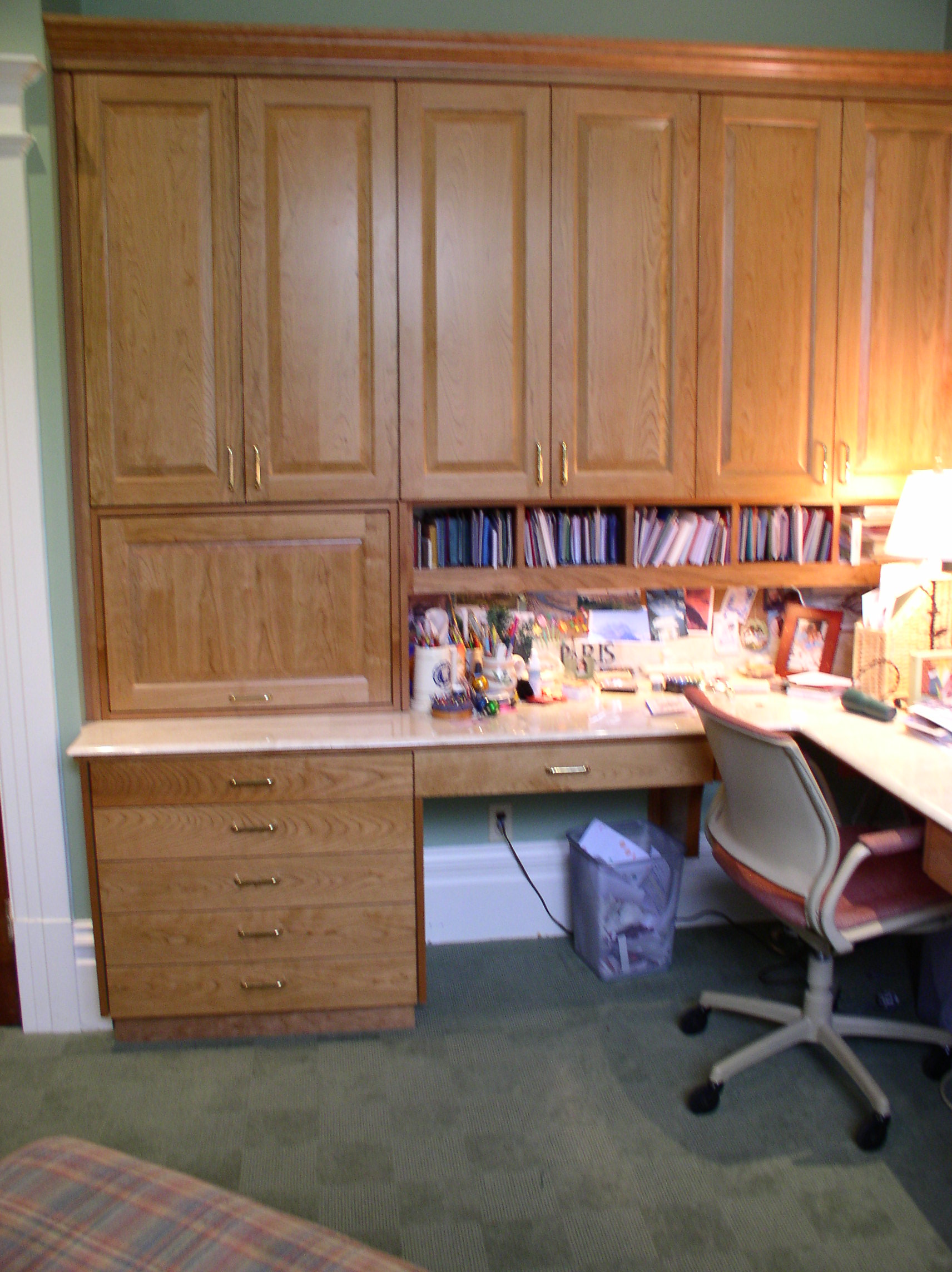 The drawers and cabinets hold all my craft supplies and photos