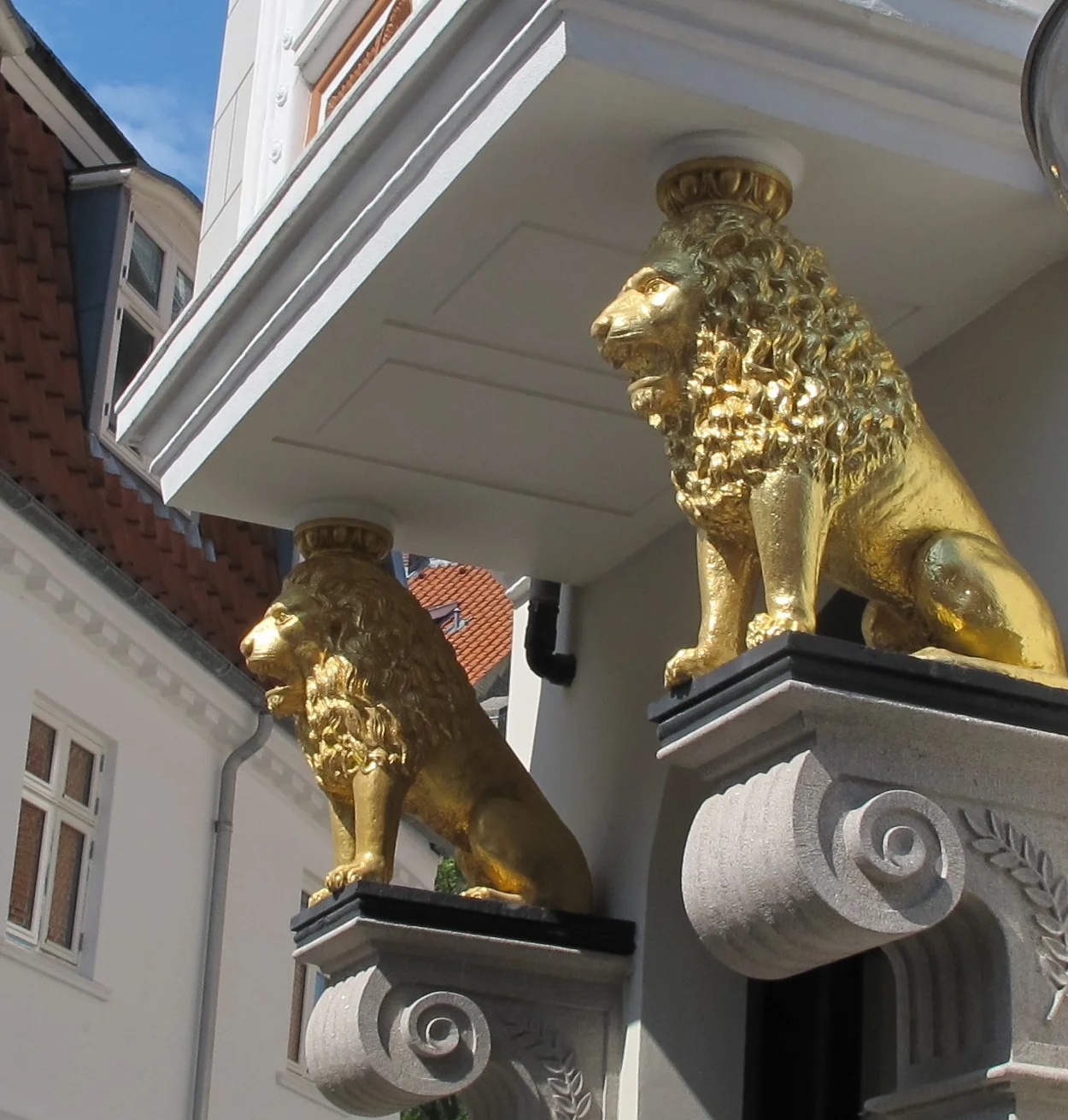  Aalborg, Denmark was smallish town with a good range of architectural details like these gilded lions. 