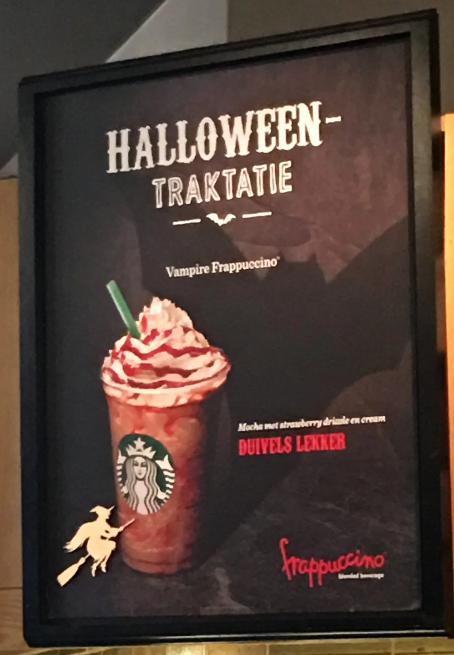  A fun Starbucks poster in Antwerp advertising a creep-looking Halloween drink. 