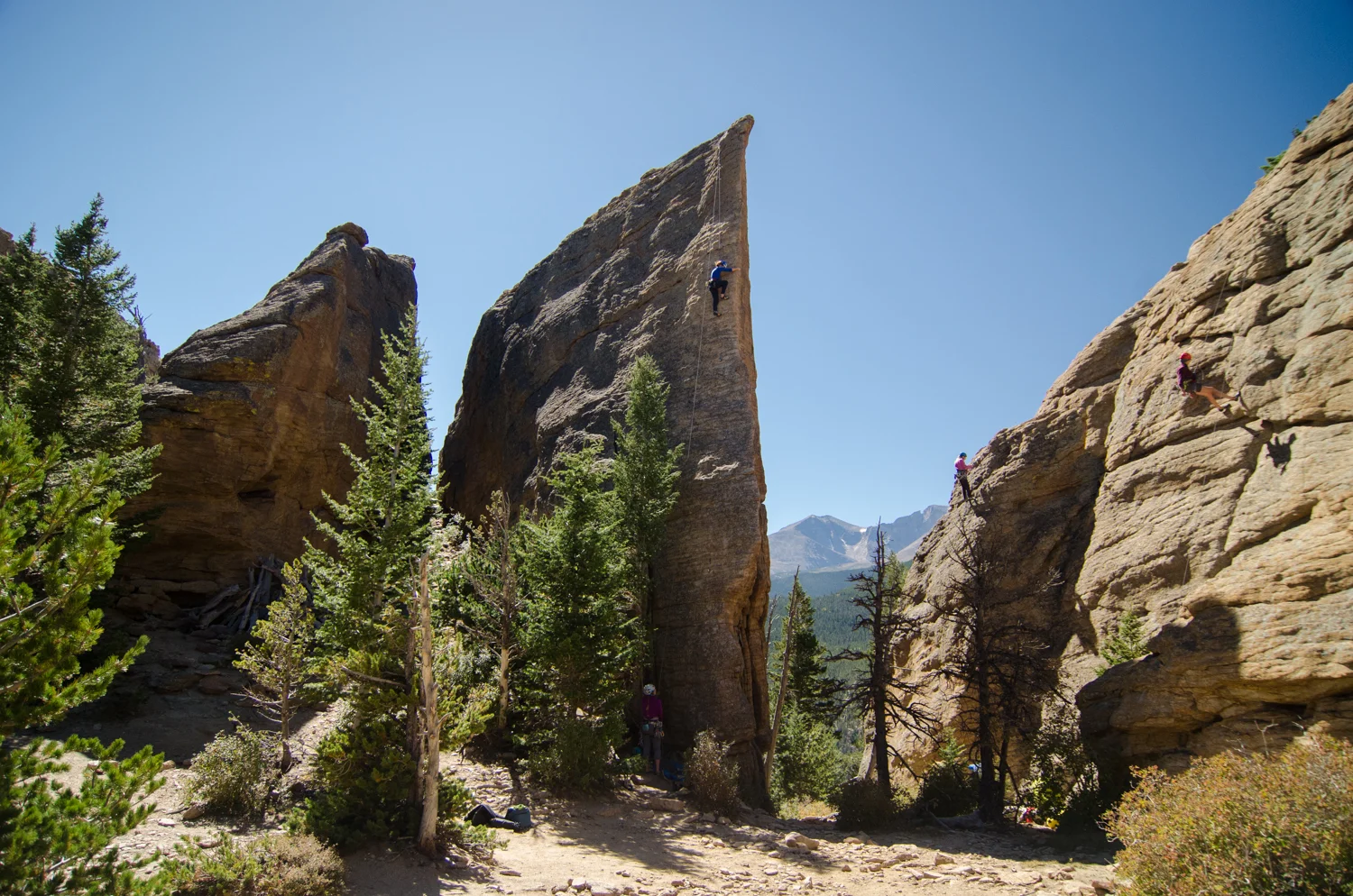 Longs Peak looms in the background, while Mo scales Edge of Time. Note: There are ONLY ladies crushing in this photo. I don't know what world I'm in, but I have never witnessed a climbing world that was short of a sausage-fest.
