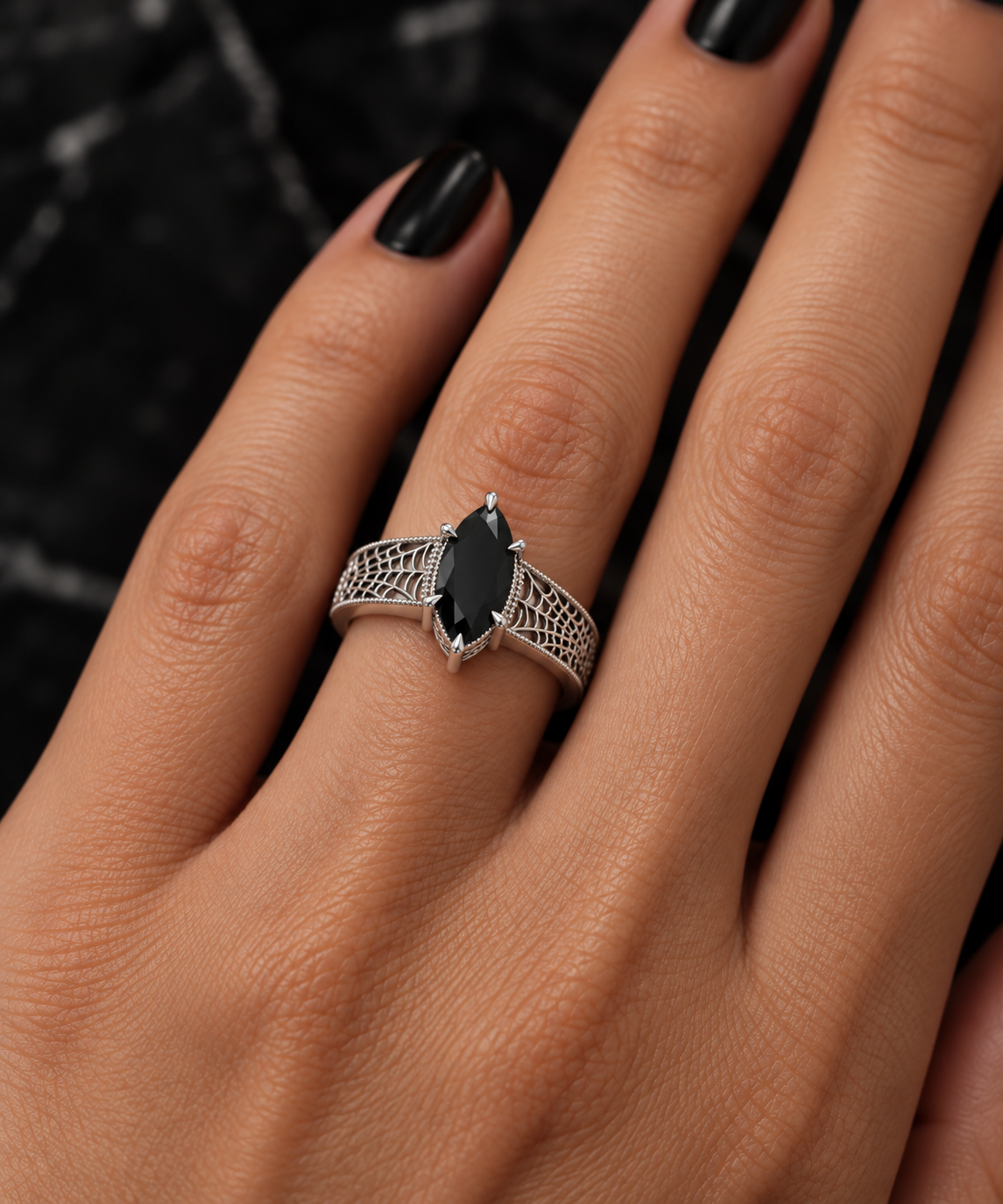 Ornate Black Marquise Ring on Hand.png