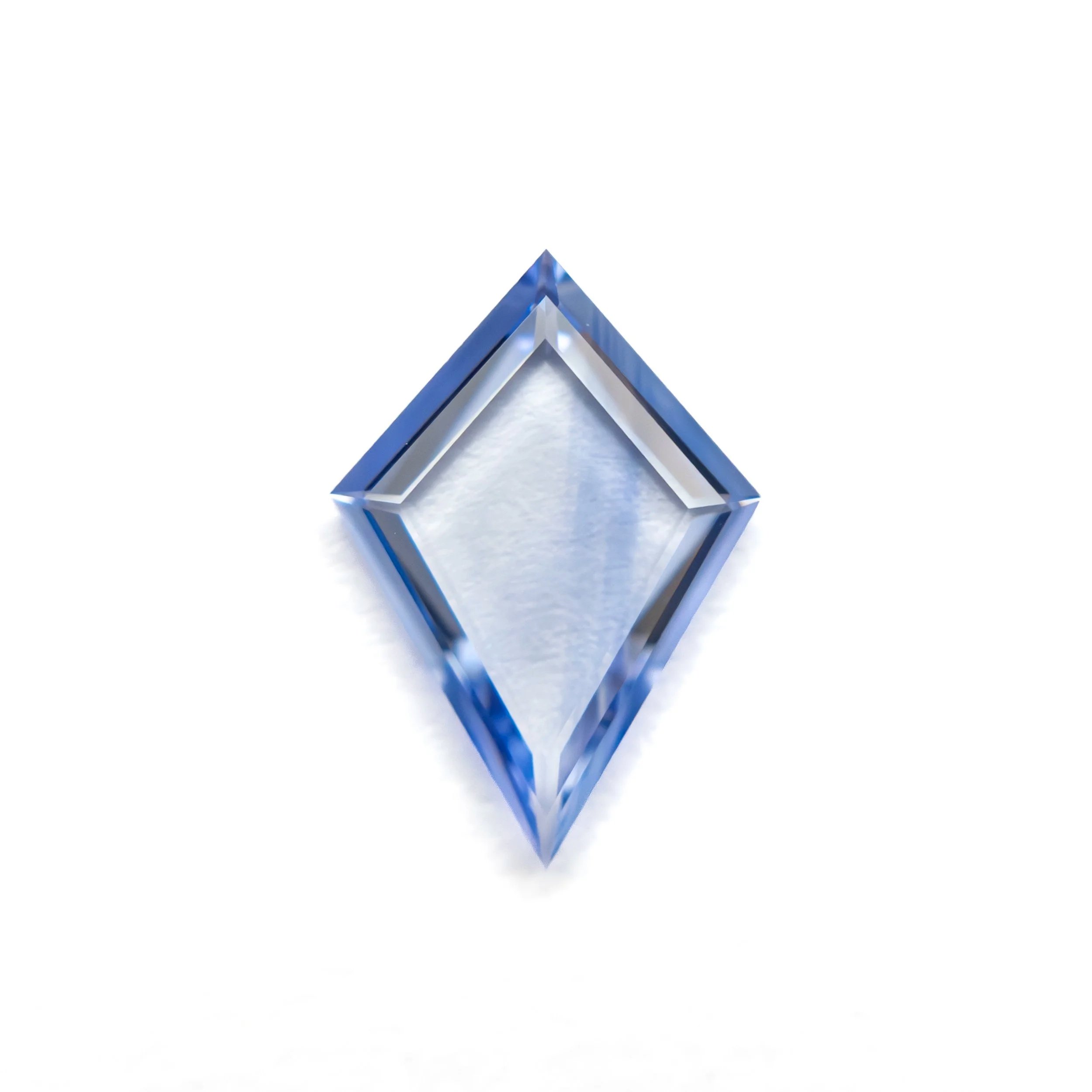 27740-07+0.61ct+9.49x6.57x1.31mm+Kite+Portrait+Cut+Sapphire+1.jpg