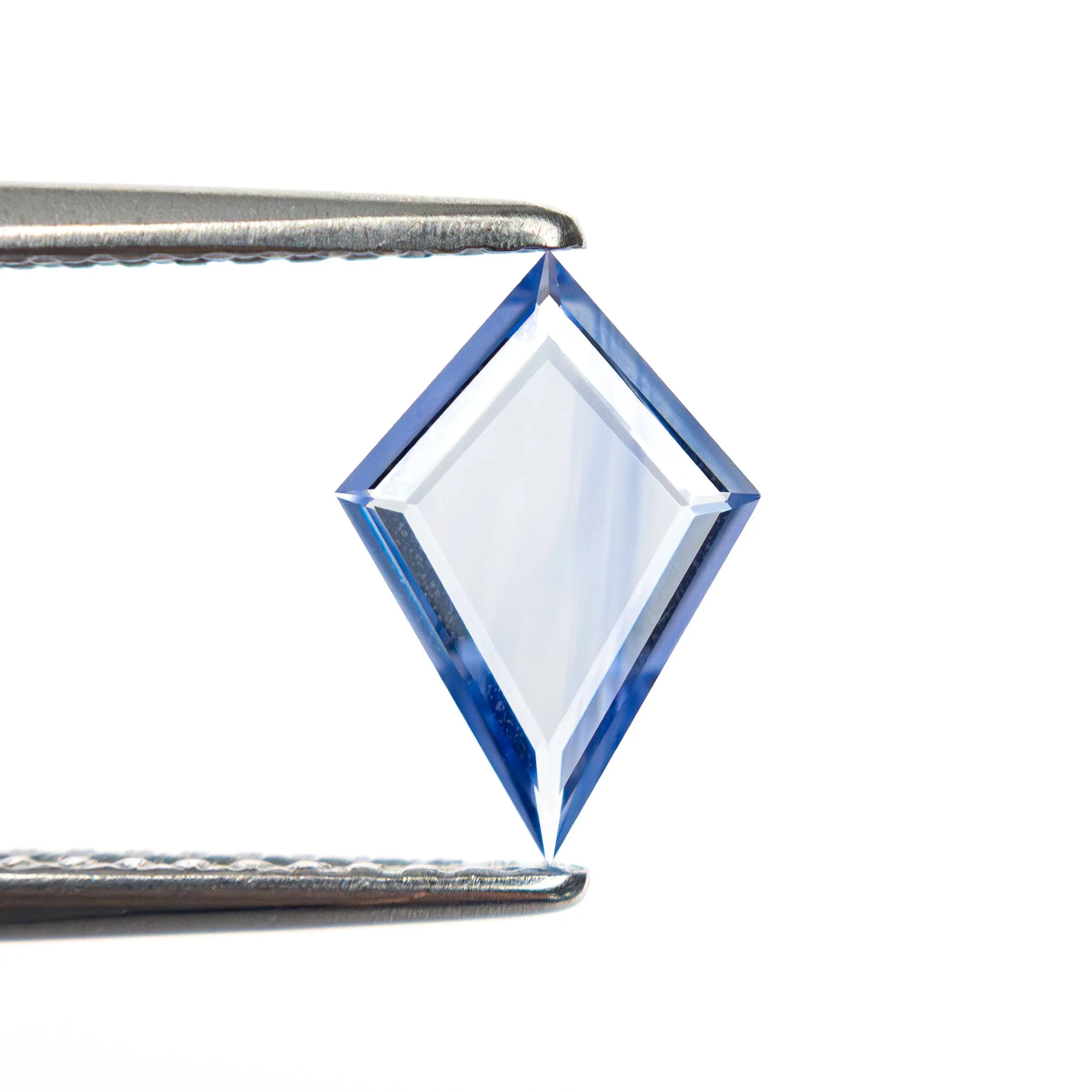 27740-07+0.61ct+9.49x6.57x1.31mm+Kite+Portrait+Cut+Sapphire+2.jpg