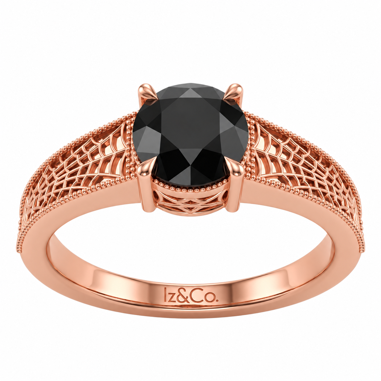 Rose Gold Filigree Ring with Black Gemstone.png