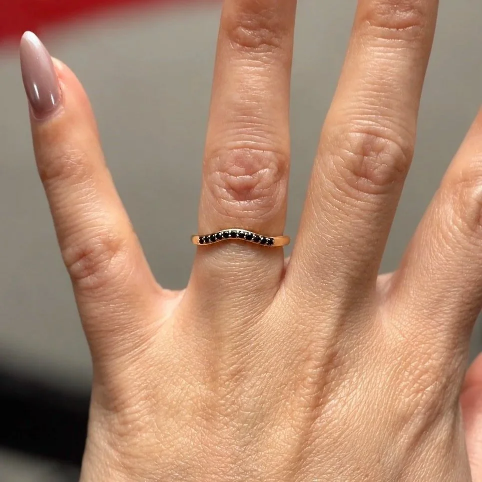 Elegant+Hand+with+Black-Stone+Gold+Ring.jpg