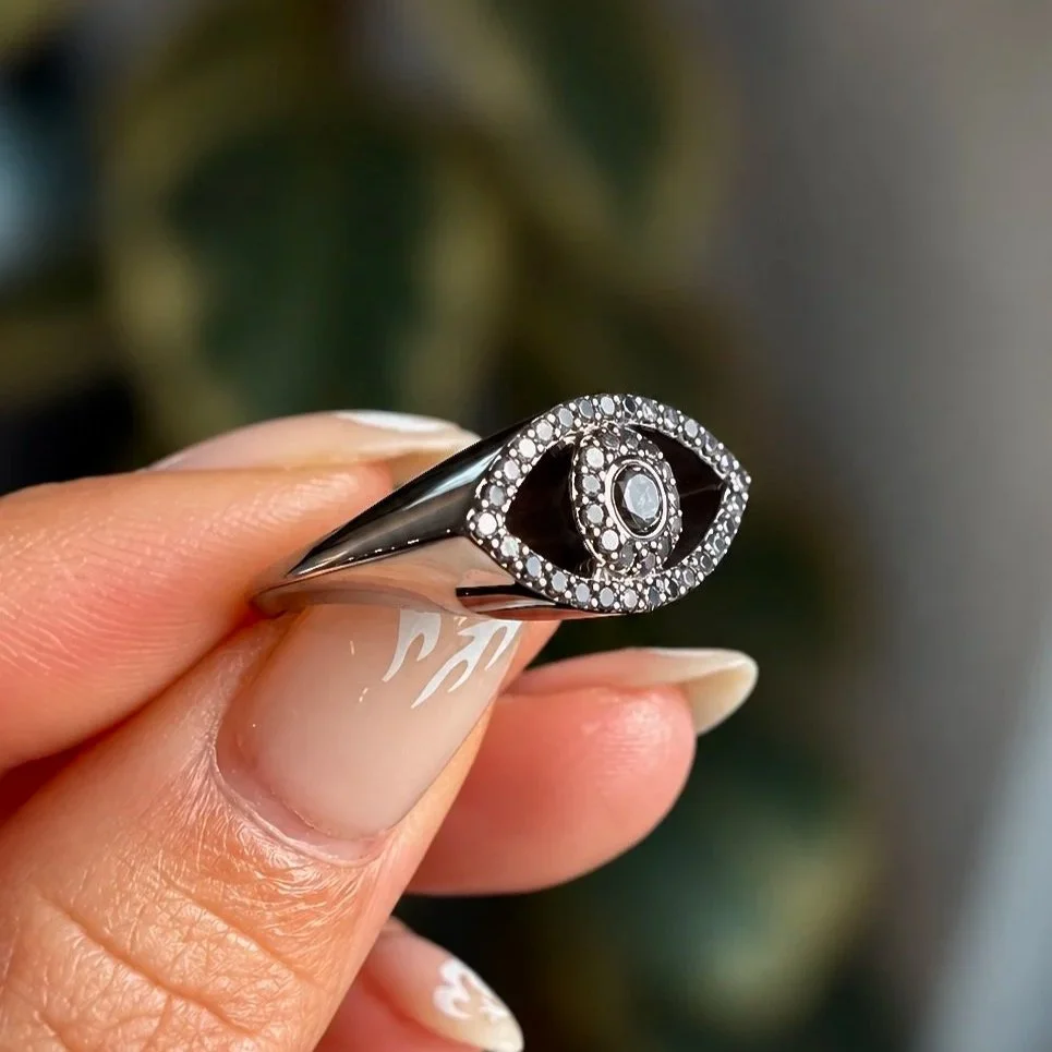 Diamond+Evil+Eye+Ring+in+Hand.jpg