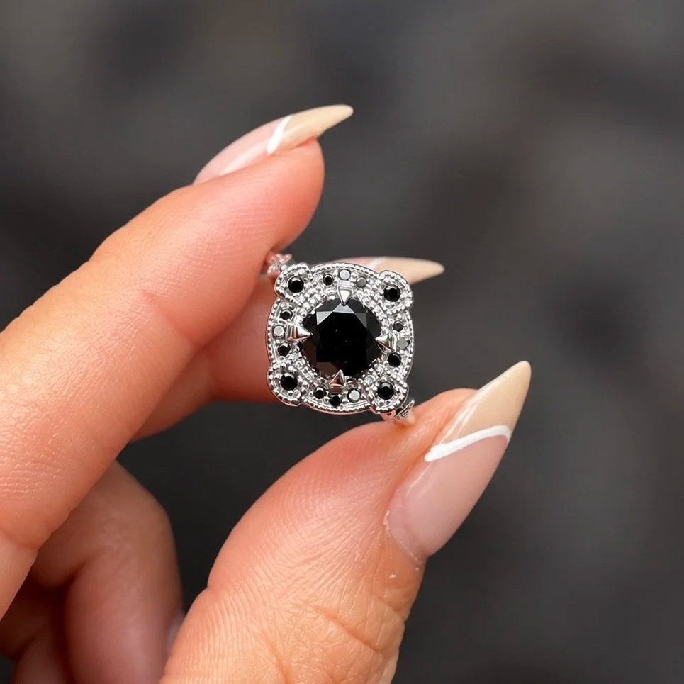 Black+Gemstone+Halo+Jewelry+in+Hand.jpg