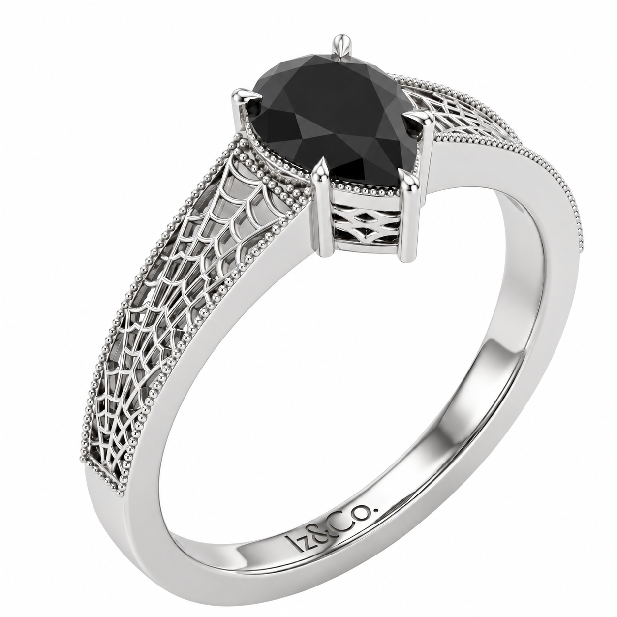 Platinum Filigree Ring with Black Gemstone.png