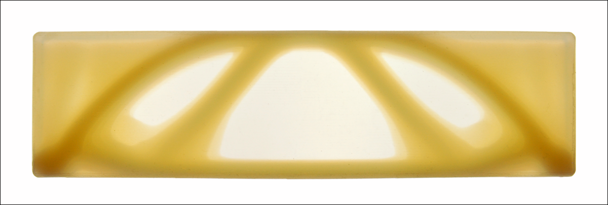 Figure 8: Using multi-material printing technology, a fuzzy bone-like structure can be created using gradients between a transparent rubbery material and an opaque hard material. In this way the actual outcome of the topology optimization process can be directly materialized.