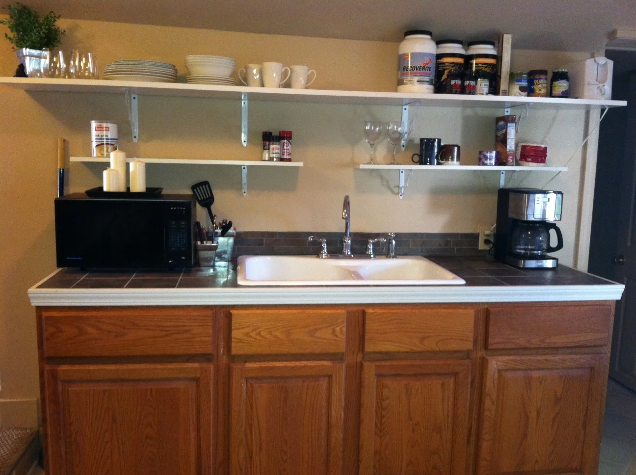 Shelving added-a place for everything, and everything in its place.