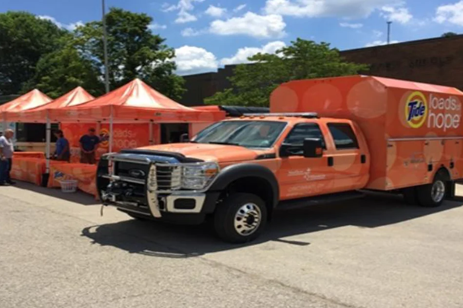  Tide Loads of Hope Truck provides mobile washing machines at Elkview Middle School in Kanawha County ( via ) 