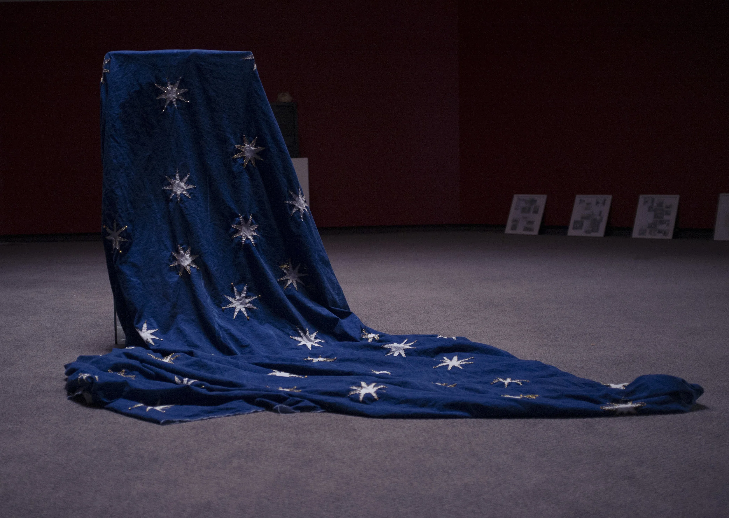  Lacuna: we sew/see the sky   Cyanotype print on cotton, gold thread, beads  2017  This object was created as a way to bridge the gap between Ada, Ohio, and Florence, Italy.&nbsp; An Italian sky (or a sky in the sense of an homage to many frescoed c