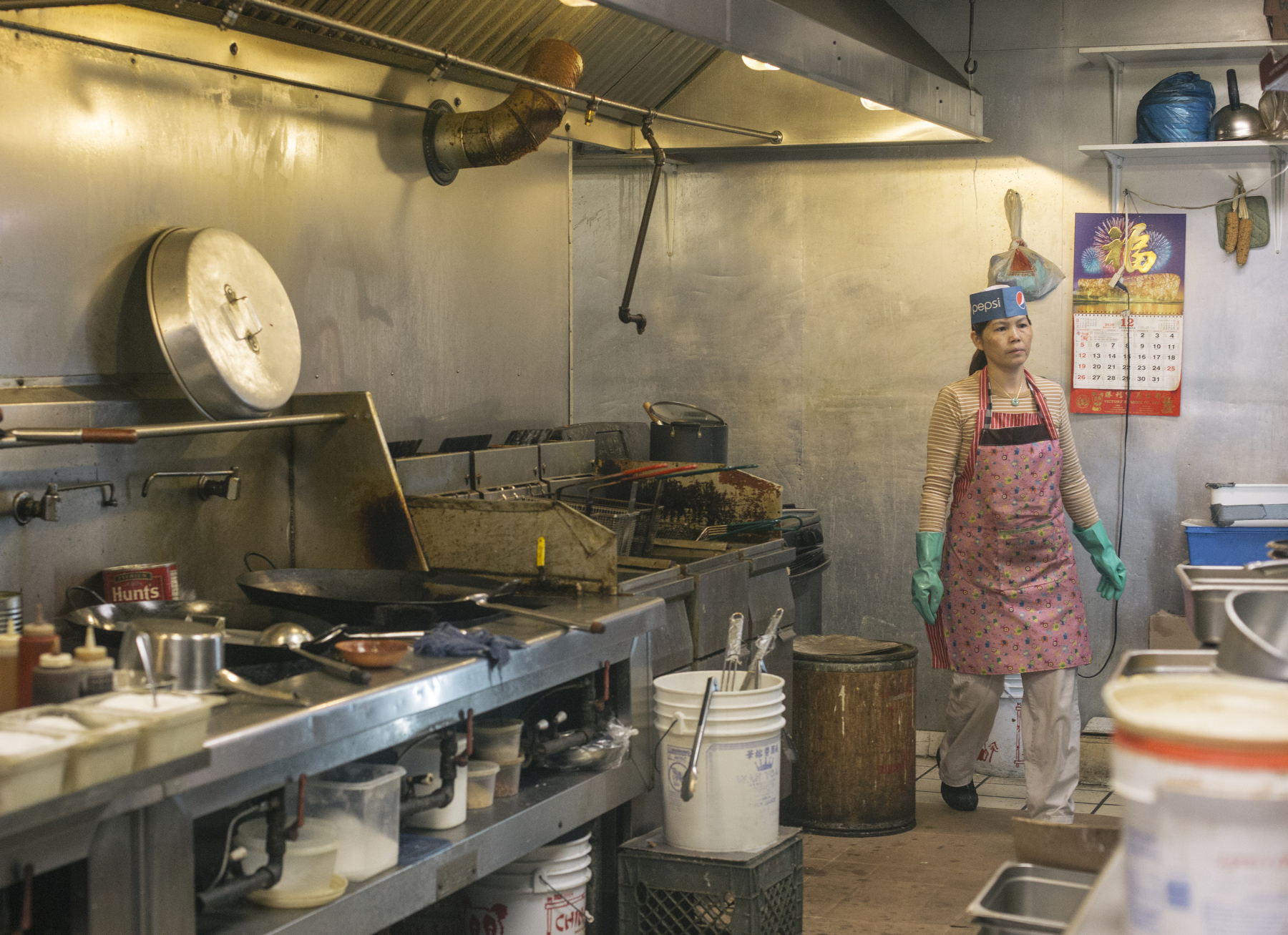 Sherry Tan prepares food for the buffet at the China Garden in Fort Kent, ME on Thursday, October 30, 2014.
