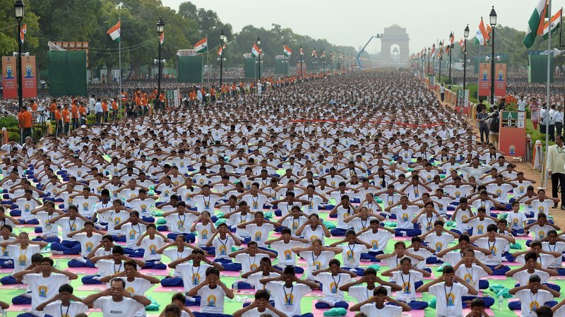 A mass yoga session on Rajpath, New Delhi's ceremonial boulevard, marks International Yoga Day.
