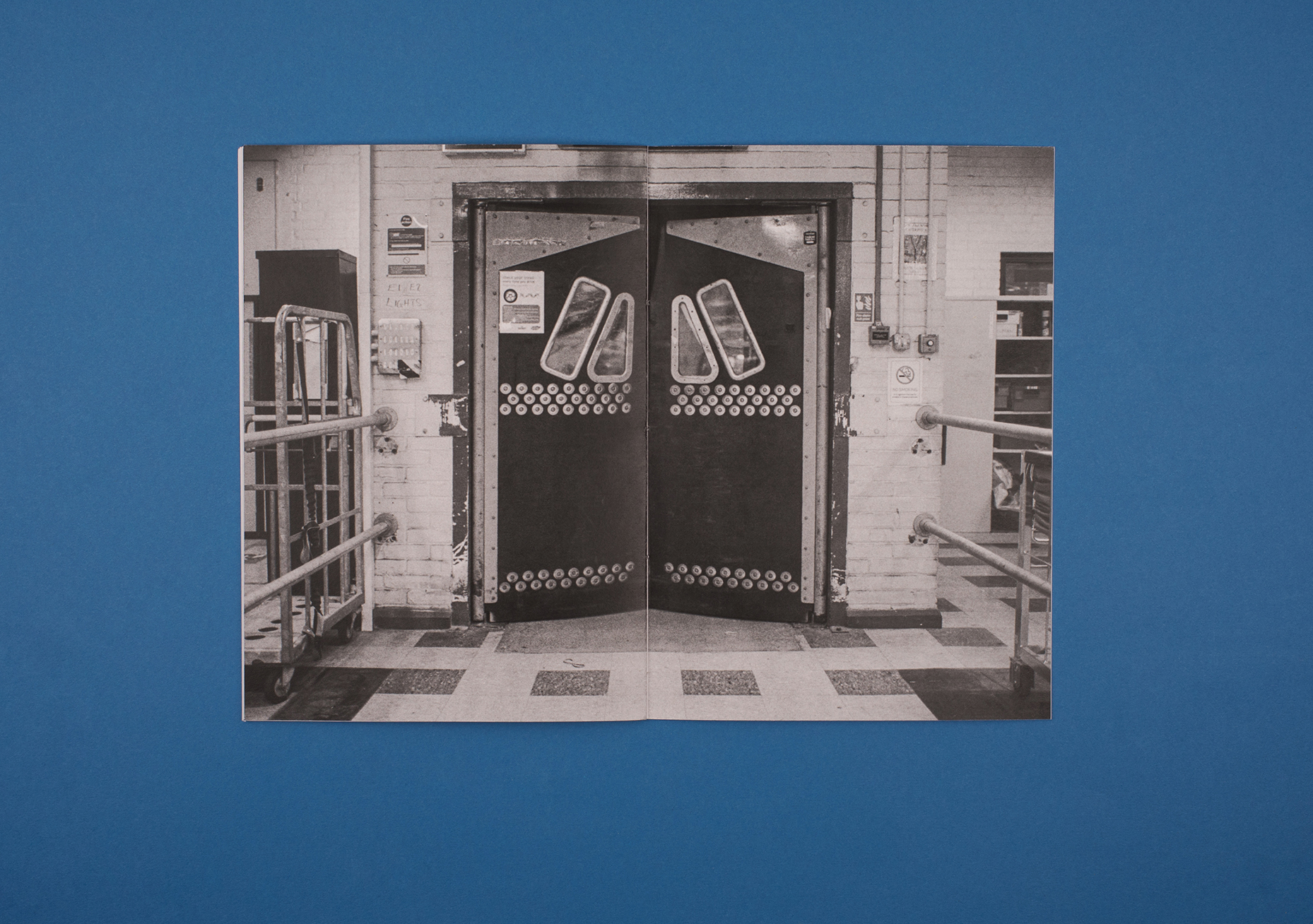 Beyond Work Zines by Photographer Curtis James. Black and white double page photograph from 'indoor postal worker' zine.