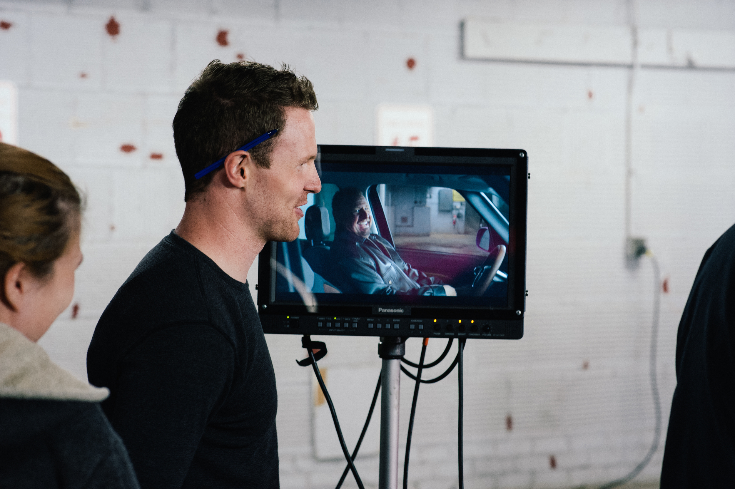 Director Jake Woodbridge coaches Actor Scott Brault in the closing moments of the commercial