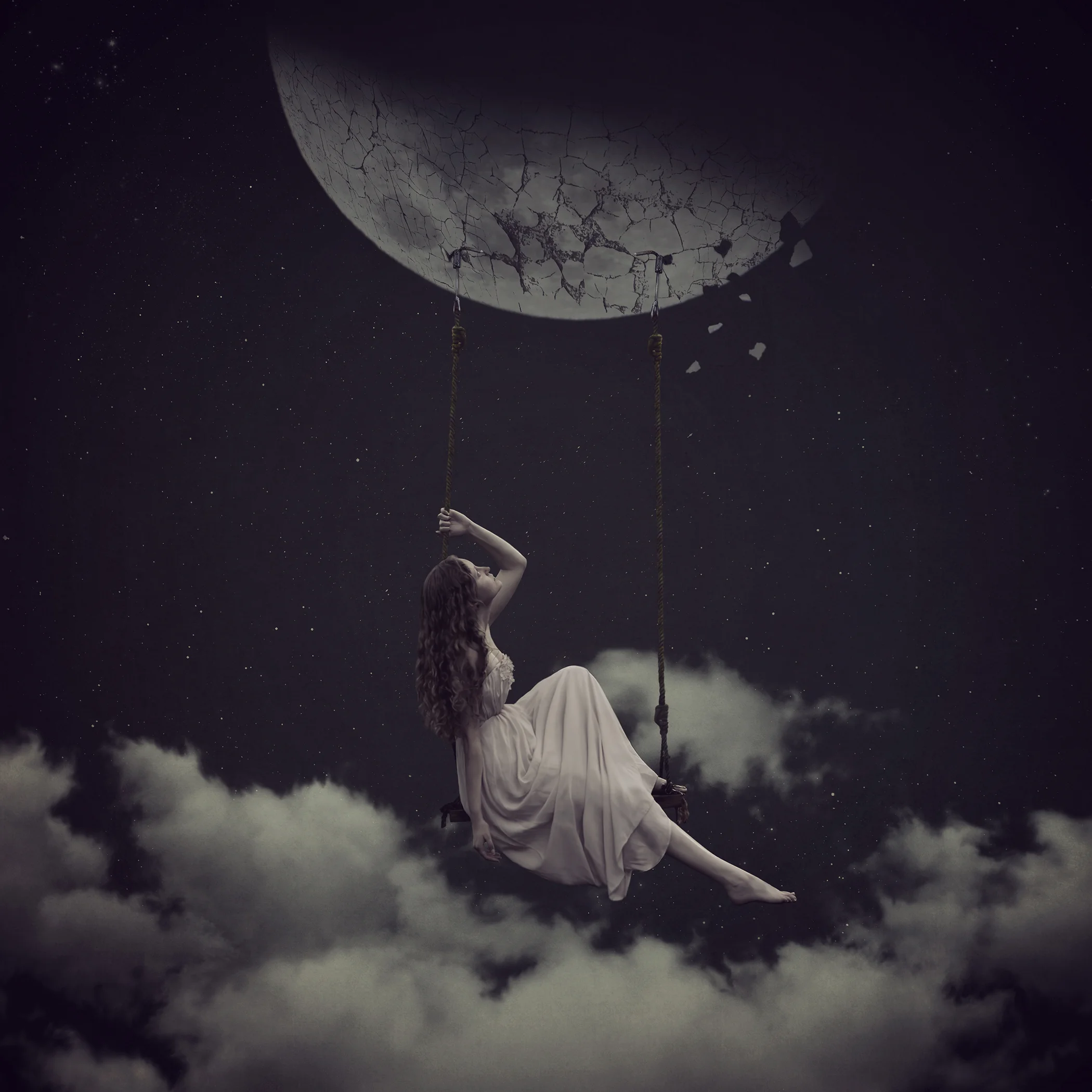 She wanted it so much... to hang by the moon and swing in the clouds. But her plans became disenchented when the moon began to fall apart, much like her dreams.