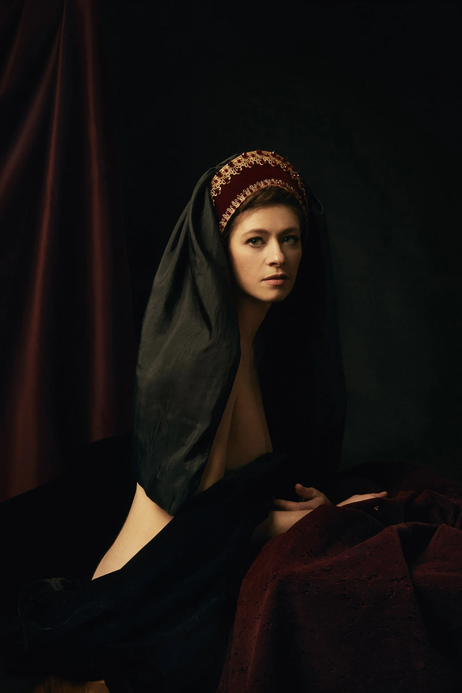 Renaissance themed photography of a woman in a French hood