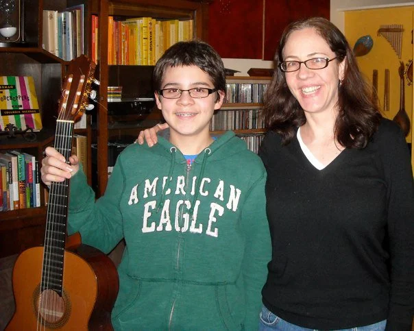 Alex, age 12, and Jennifer, after he performed "The Miller's Dance" by Manuel de Falla and "Etude No. 1" by Leo Brouwer at the S.A.M. competition, winning 1st prize, 2008. Alex is currently majoring in chemistry at Lawrence University and still plays classical guitar.