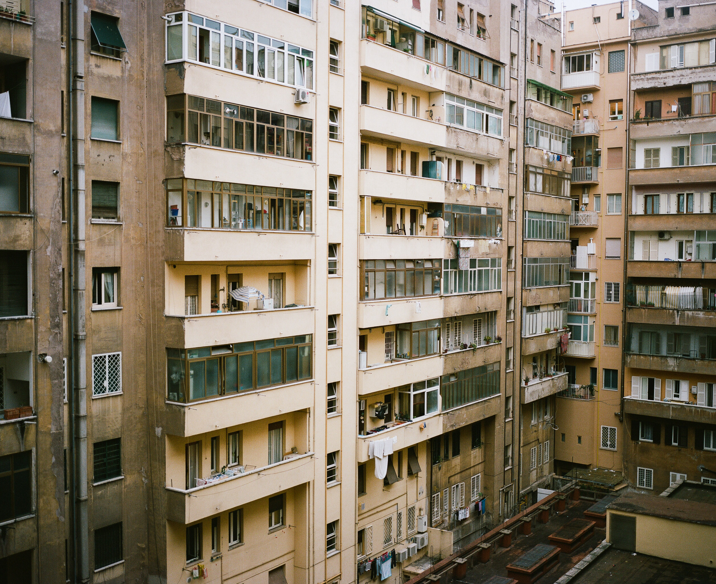 Interior courtyard of a building in Rome, balconies and windows